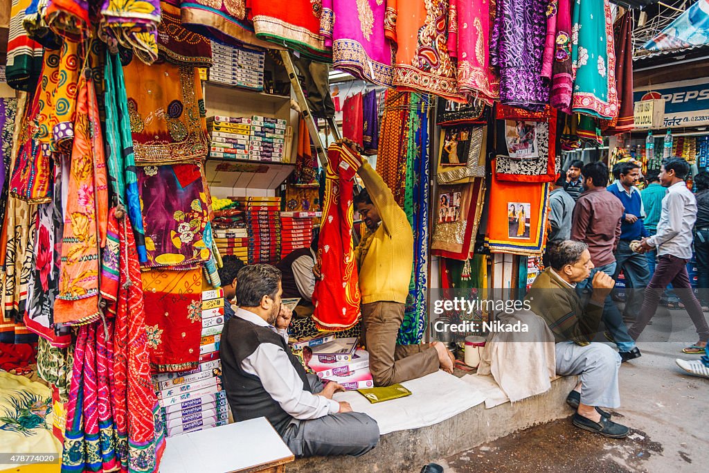 Sari shop on a street in old Delhi, India