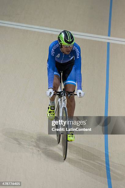 Argentinian cyclist Adrian Richeze competes in men's Omnium 1km Time Trial of Indoor cycling during day eight of the X South American Games Santiago...