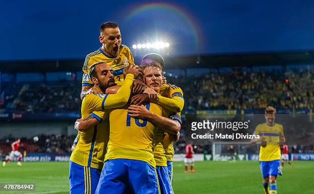 John Guidetti of Sweden celebrates his goal with his team-mates during UEFA U21 European Championship semi final match between Denmark and Sweden at...