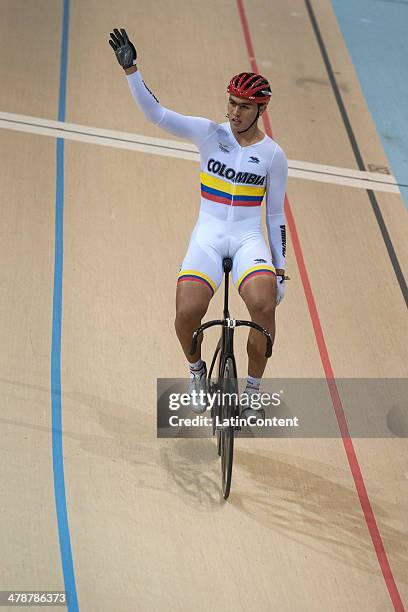 Colombian gold medalist Fabian Puerta competes in men's Keirin of Indoor cycling during day eight of the X South American Games Santiago 2014 at...