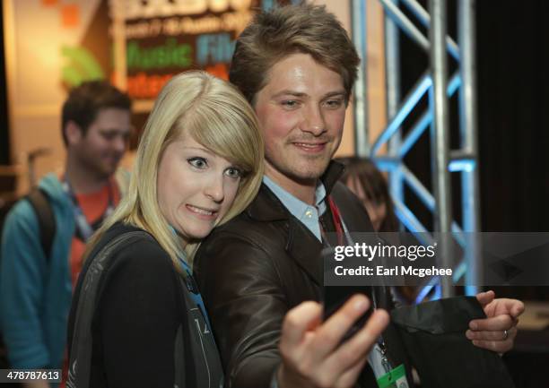Musician Taylor Hanson takes a selfie with a fan at "When to Tune Out the Trainwreck" during the 2014 SXSW Music, Film + Interactive Festival at...