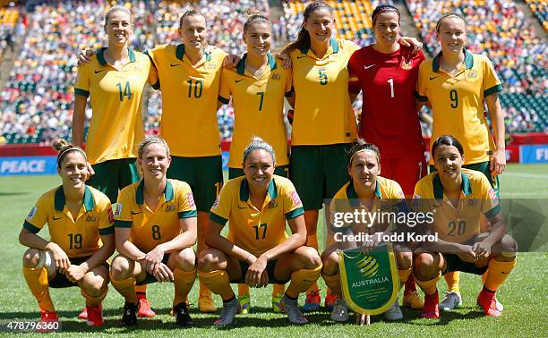 Team members from Australia pose for a team photo during the FIFA Women's World Cup Canada Quarter Final match between Australia and Japan at...