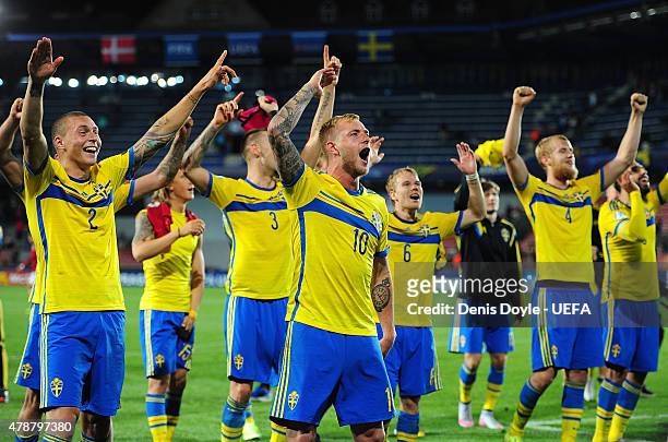 John Guidetti of Sweden celebrates with teammates after Sweden beat Denmark 4-1 during the UEFA Under 21 European Championship 2015 semi-final match...