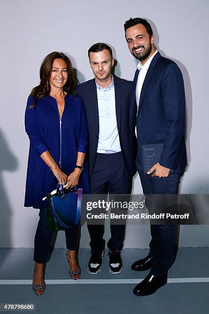 Fashion designer Kris Van Assche standing between Katia Toledano and her son Alan Toledano pose Backstage after the Dior Homme Menswear Spring/Summer...