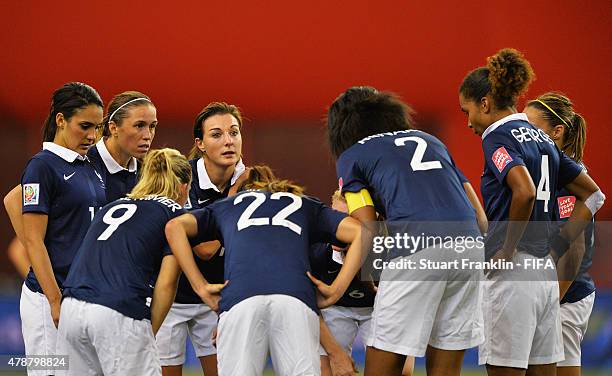 Claire Lavogez of France talks with her teamates during the quarter final match of the FIFA Women's World Cup between Germany and France at Olympic...