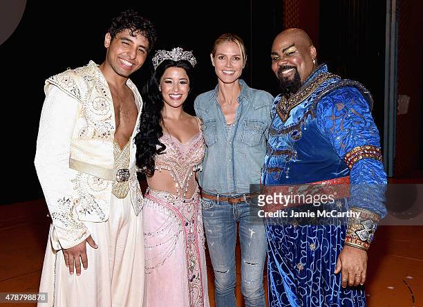 Heidi Klum poses backstage with Disney's "Aladdin The Musical" On Broadway cast members Trent Saunders, Courtney Reed and James Monroe Iglehart at...
