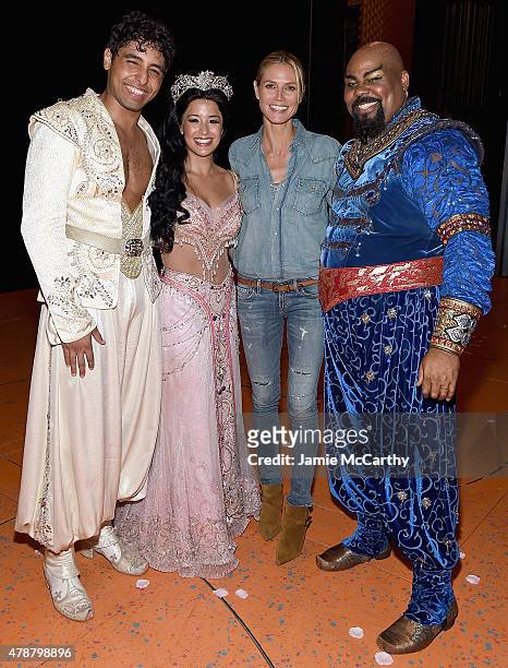 Heidi Klum poses backstage with Disney's "Aladdin The Musical" On Broadway cast members Trent Saunders, Courtney Reed and James Monroe Iglehart at...