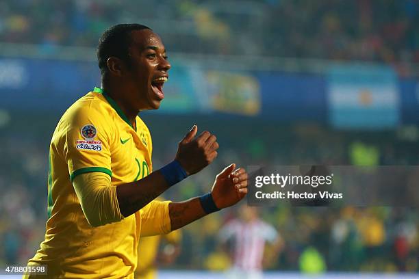 Robinho of Brazil celebrates after scoring the opening goal during the 2015 Copa America Chile quarter final match between Brazil and Paraguay at...