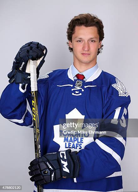 Nikita Korostelev poses for a portrait after being selected 185th by the Toronto Maple Leafs during the 2015 NHL Draft at BB&T Center on June 27,...