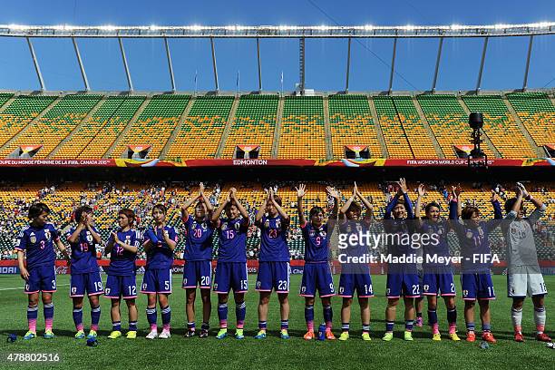 Japan acknowledges their fans following their 1-0 win over Australia during the FIFA Women's World Cup Canada 2015 quarter final match at...