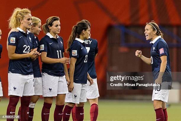 Camille Abily of France tries to encourage her teammates during the 2015 FIFA Women's World Cup quarter final match against Germany at Olympic...