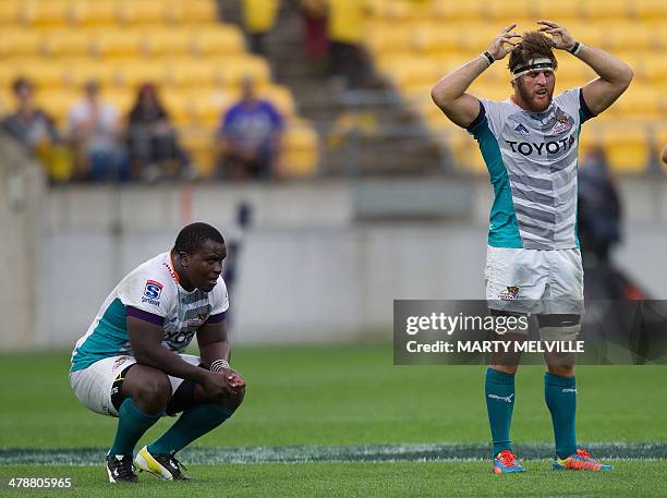 Central Cheetahs Trevor Nyakane and teammate Boom Prinsloo react after their loss against the Wellington Hurricanes during their Super 15 rugby union...