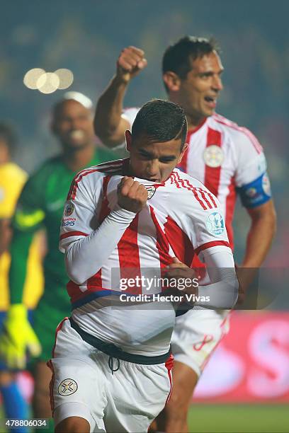 Derlis Gonzalez of Paraguay celebrates after scoring the first goal of his team through a penalty kick during the 2015 Copa America Chile quarter...