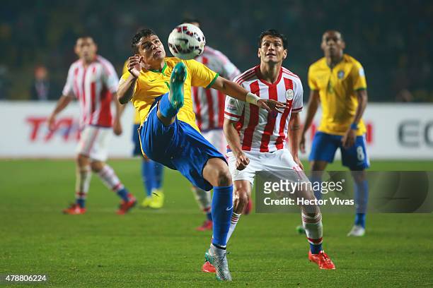 Thiago Silva of Brazil kicks the ball during the 2015 Copa America Chile quarter final match between Brazil and Paraguay at Ester Roa Rebolledo...