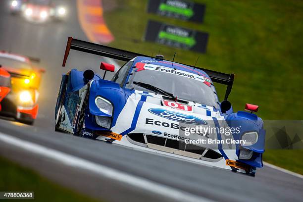 The Ford Riley DP of Scott Pruett and Joey Hand races in the rain during practice for the Sahlen's Six Hours of the Glen at Watkins Glen...