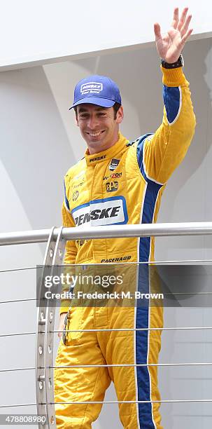 Race car driver Simon Pagenaud attends the Indy Car MAVTV 500 race at the Auto Club Speedway on June 27, 2015 in Fontana, California.