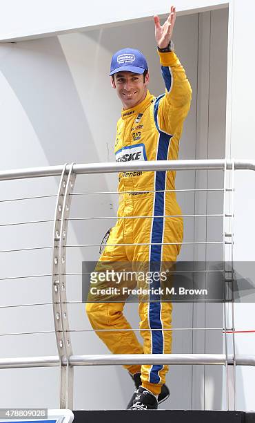 Race car driver Simon Pagenaud attends the Indy Car MAVTV 500 race at the Auto Club Speedway on June 27, 2015 in Fontana, California.