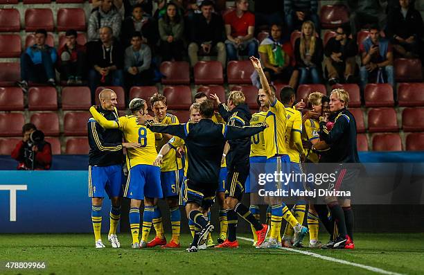 Players of Sweden celebrate after UEFA U21 European Championship semi final match between Denmark and Sweden at Generali Arena on June 27, 2015 in...