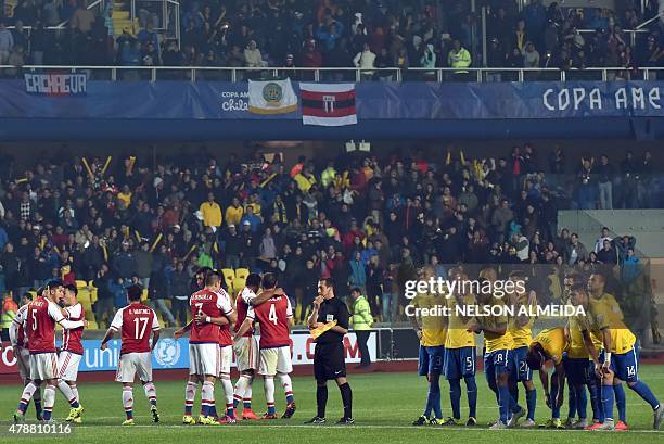 Paraguayan players celebrate a penalty kick during their 2015 Copa America football championship quarter-final match against Brazil, in Concepcion,...