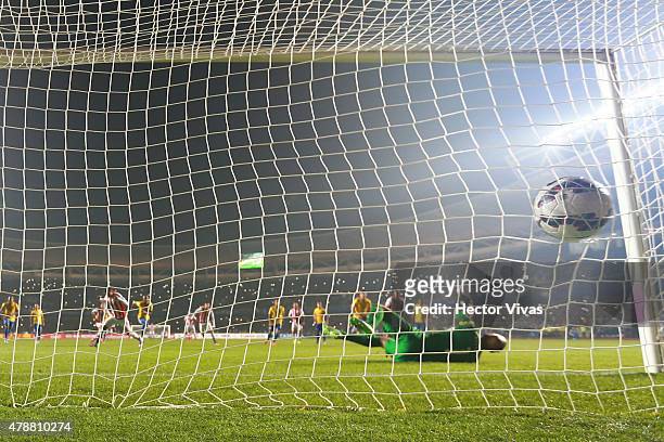 Derlis Gonzalez of Paraguay scores the tying goal during the 2015 Copa America Chile quarter final match between Brazil and Paraguay at Ester Roa...