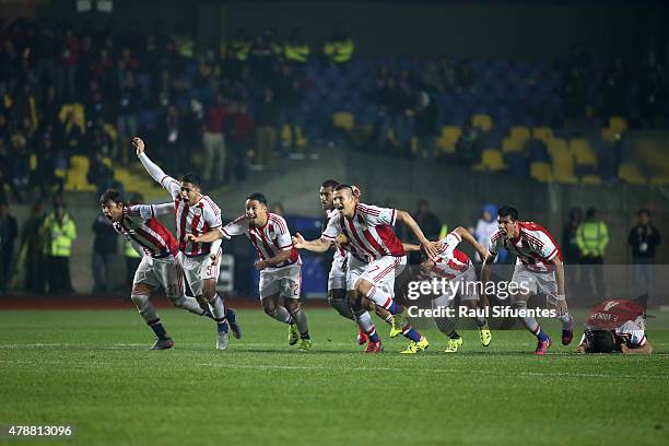 Players of Paraguay celebrate after winning the 2015 Copa America Chile quarter final match between Brazil and Paraguay at Ester Roa Rebolledo...