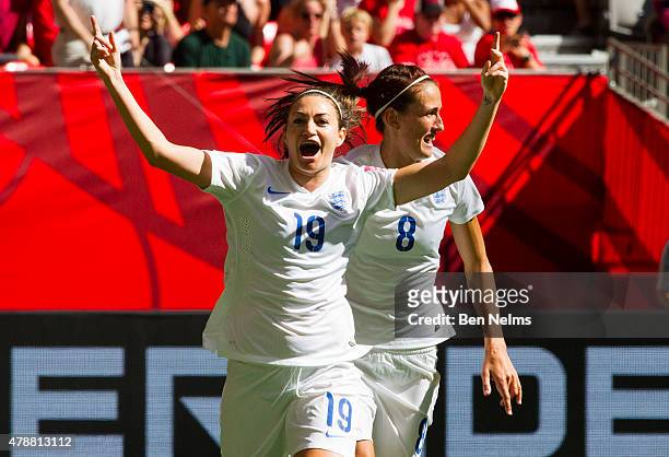 Jodie Taylor of England celebrates her goal against Canada with teammate Jill Scott during the FIFA Women's World Cup Canada 2015 Quarter Final match...