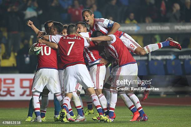 Players of Paraguay celebrate after winning the 2015 Copa America Chile quarter final match between Brazil and Paraguay at Ester Roa Rebolledo...