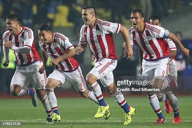 Players of Paraguay celebrate after winning the 2015 Copa America Chile quarter final match between Brazil and Paraguay at Ester Roa Rebolledo...