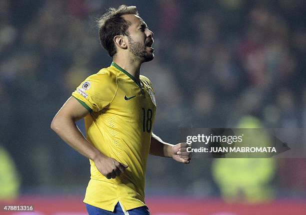 Brazil's midfielder Everton Ribeiro gestures after missing his penalty in the shoot-out of their 2015 Copa America football championship...