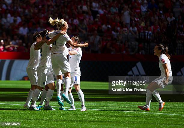 Steph Houghton of England celebrates with teammates and Claire Rafferty after Lucy Bronze scored against Canada during the FIFA Women's World Cup...