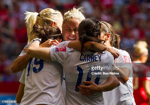 Steph Houghton of England celebrates with teammates after Lucy Bronze scored against Canada during the FIFA Women's World Cup Canada 2015 Quarter...
