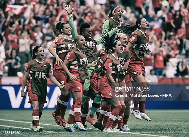 The Canadian team celebrate Christine Sinclair of Canada's goal during the FIFA Women's World Cup 2015 Quarter Final match between England and Canada...