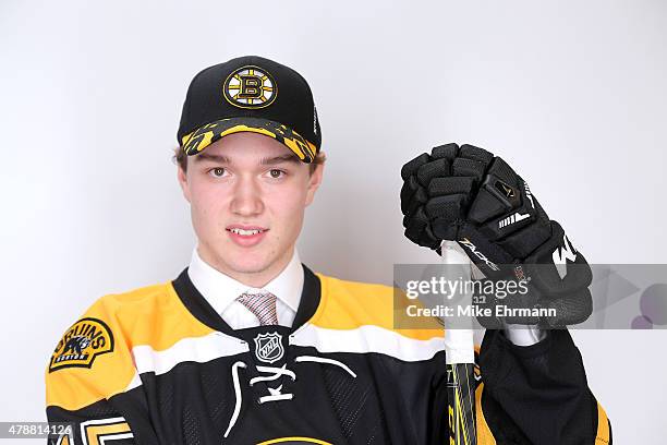 Jakob Forsbacka-Karlsson poses after being selected 45th overall by the Boston Bruins during the 2015 NHL Draft at BB&T Center on June 27, 2015 in...