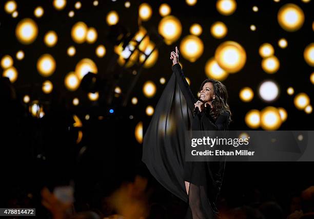 Singer Martina McBride performs during the 50th Academy of Country Music Awards at AT&T Stadium on April 19, 2015 in Arlington, Texas.