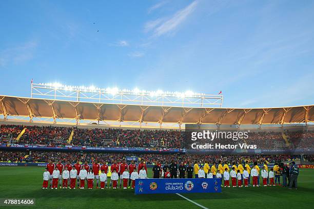 Players of both teams sing their national anthem prior the 2015 Copa America Chile quarter final match between Brazil and Paraguay at Ester Roa...
