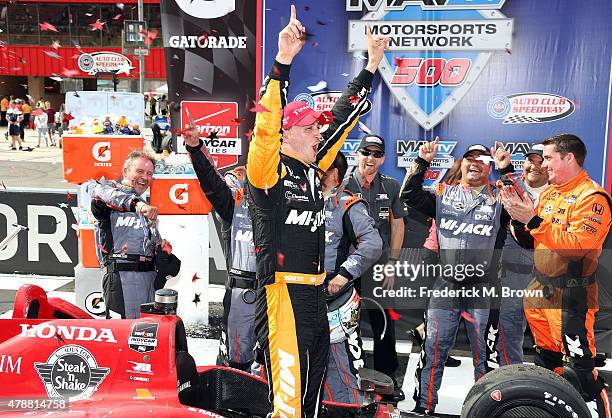 Race car driver Graham Rahal is the winner of the Indy Car MAVTV 500 race at the Auto Club Speedway on June 27, 2015 in Fontana, California.