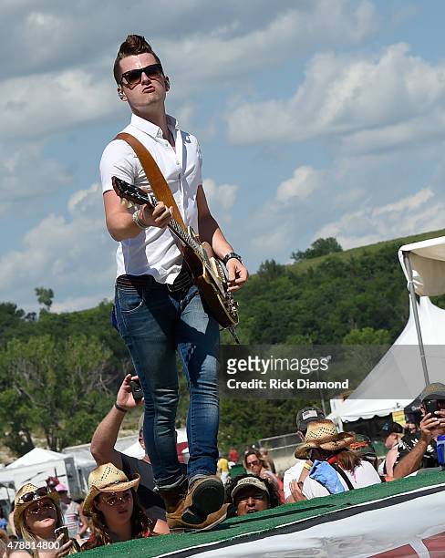 Singer/Songwriter Chase Bryant performs during day 3 of the 20th Anniversary of Kicker Country Stampede on June 27, 2015 at Tuttle Creek State Park...