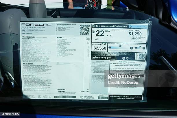 sticker price label on a new porsche - auto sticker price stock pictures, royalty-free photos & images