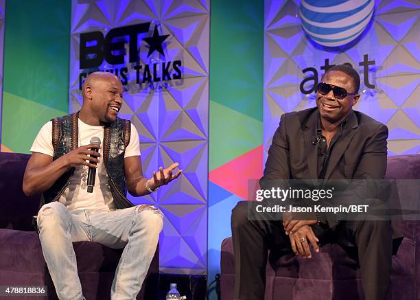 Professional boxer Floyd Mayweather, Jr. And recording artist Doug E. Fresh speak onstage during the Genius Talks presented by AT&T during the 2015...