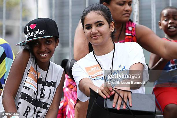 Admena Sembo and Chrystal Aguilera attend the BET & Make A Wish Foundation Recipients at the BET Experience At LA. Live Day 2- Weekend Events on June...