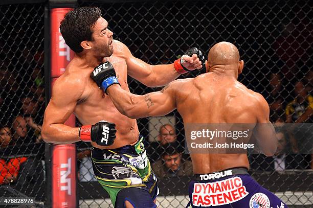 Yoel Romero of Cuba punches Lyoto Machida of Brazil in their middleweight during the UFC Fight Night event at the Hard Rock Live on June 27, 2015 in...