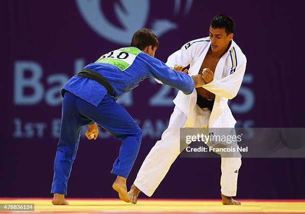 Andraz Jereb of Slovenia and Georgii Zantaraia of Ukraine compete during the Men's Judo Team contest round of 16 on day sixteen of the Baku 2015...