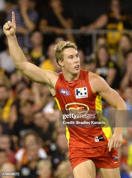 Tom Lynch of the Suns celebrates after kicking a goal during the round one AFL match between the Gold Coast Suns and the Richmond Tigers at Metricon...