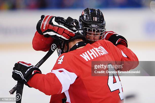 Canada players Derek Whitson and Billy Bridges celebrate after the ice sledge hockey bronze medal game between Canada and Norway at the Shayba Arena...