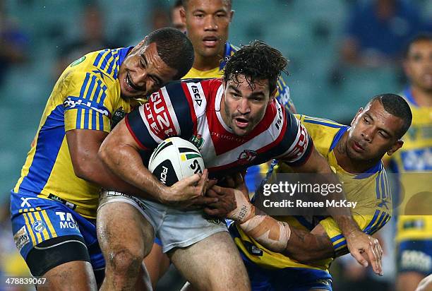 Aidan Guerra of the Roosters is tackled by the Eels defence during the round two NRL match between the Sydney Roosters and the Parramatta Eels at...