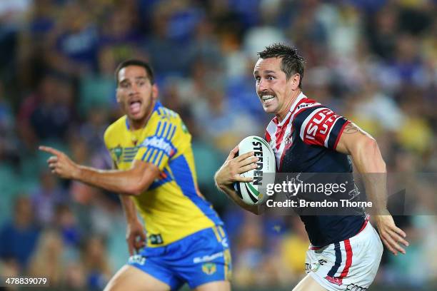 Mitchell Pearce of the Roosters runs the ball during the round two NRL match between the Sydney Roosters and the Parramatta Eels at Allianz Stadium...