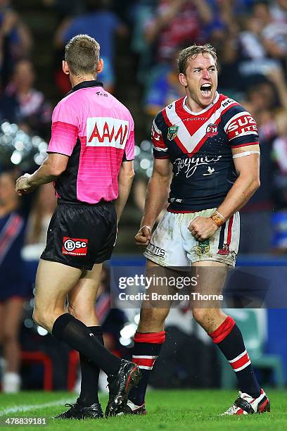 Mitchell Aubusson of the Roosters celebrates after scoring a try during the round two NRL match between the Sydney Roosters and the Parramatta Eels...