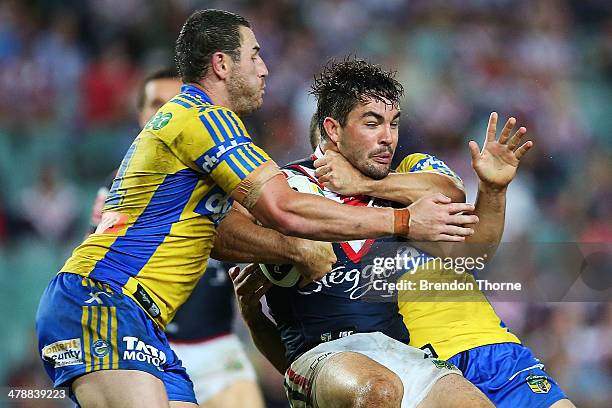 Aidan Guerra of the Roosters is tackled by Ben Smith of the Eels during the round two NRL match between the Sydney Roosters and the Parramatta Eels...