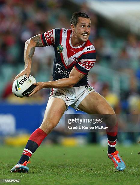 Mitchell Pearce of the Roosters looks to pass during the round two NRL match between the Sydney Roosters and the Parramatta Eels at Allianz Stadium...