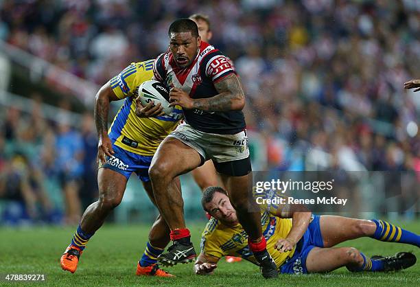 Frank Paul Nuuausala of the Roosters makes a break during the round two NRL match between the Sydney Roosters and the Parramatta Eels at Allianz...